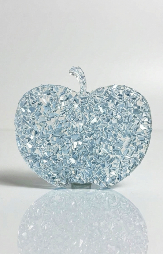 Top-down studio shot of a thick apple casting with a realistic yellow crystal druzy texture covering the entire surface.