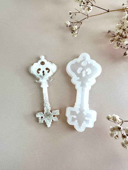 Small Silicone Mold in the Shape of a Key for Decorating a Christmas Tree